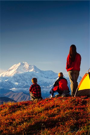 enjoy mountain view - A mother and her two sons view the south summit of Mt. McKinley from their campsite in Peters Hills, Denali State Park, Southcentral Alaska, Fall/n Stock Photo - Rights-Managed, Code: 854-03646848