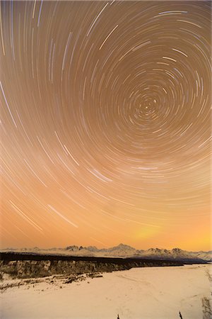 snow landscape nobody night - Night time view of star trails over Mt. McKinley with Northern Lights in the background, Denali State Park, Southcentral Alaska, Winter Stock Photo - Rights-Managed, Code: 854-03646879