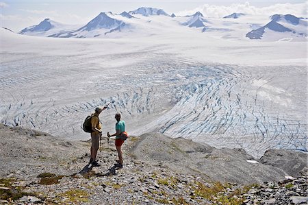 Man and woman enjoy view overlooking Harding Icefield, Kenai Fjords National Park, Kenai Peninsula, Southcentral Alaska, Summer Stock Photo - Rights-Managed, Code: 854-03739584