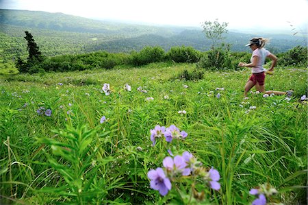 state park usa - Female jogger runs the Near Point Trail in Chugach State Park near Anchorage, Southcentral Alaska, Summer Stock Photo - Rights-Managed, Code: 854-03739627