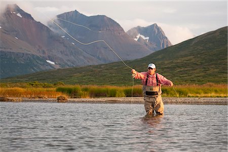 profond - Mouche de pêcheur à la ligne de pêche dans la baie de Bristol dans la soirée près de Crystal Creek Lodge, King Salmon, sud-ouest de l'Alaska, l'été Photographie de stock - Rights-Managed, Code: 854-03739729