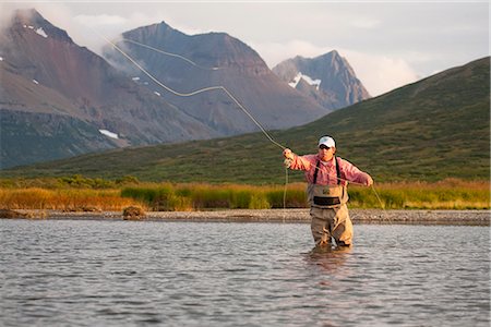 fishing deep sea - Angler fly fishing in Bristol Bay in the evening near Crystal Creek Lodge, King Salmon, Southwest Alaska, Summer Stock Photo - Rights-Managed, Code: 854-03739729