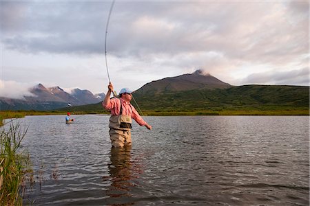 deep sea - Anglers fly fishing in Bristol Bay in the evening near Crystal Creek Lodge, King Salmon, Southwest Alaska, Summer Stock Photo - Rights-Managed, Code: 854-03739723