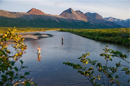 simsearch:854-03739733,k - Anglers fly fishing in Bristol Bay in the evening near Crystal Creek Lodge with a floatplane moored in the background, King Salmon, Southwest Alaska, Summer Foto de stock - Con derechos protegidos, Código: 854-03739732