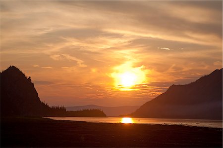 fiume yukon - Sunset over the Yukon River in Yukon-Charley Rivers National Preserve  Interior Alaska, Summer Fotografie stock - Rights-Managed, Codice: 854-03739747