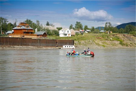 preserved - A family floats in a cataraft past the village of Eagle on the Yukon River, Interior Alaska, Summer Stock Photo - Rights-Managed, Code: 854-03739765