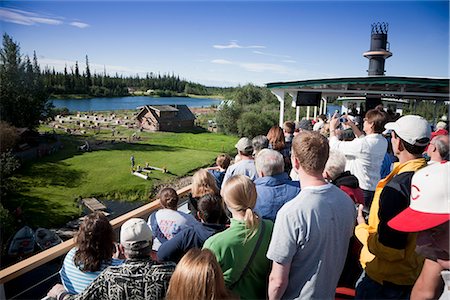 simsearch:854-03361864,k - Tourists on Riverboat Discovery tour view Iditarod champion Susan Butcher's Trail Breaker Kennel demostration along the Chena River, Fairbanks, Interior Alaska, Summer Stock Photo - Rights-Managed, Code: 854-03739777