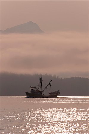 simsearch:854-05974562,k - A commercial fishing seiner travels to a pink salmon opening on a misty morning in Fredrick Sound and Stephens Passage, Inside Passage, Tongass National Forest, Southeast Alaska, Summer Foto de stock - Con derechos protegidos, Código: 854-03739842