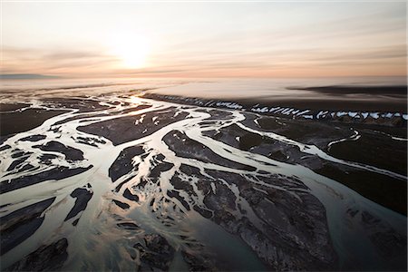 simsearch:854-03740148,k - Aerial view of the sunrise over the Sagavanirktok River and fog hanging over the Franklin Bluffs near the James Dalton Highway, Arctic Alaska, Summer Stock Photo - Rights-Managed, Code: 854-03740263