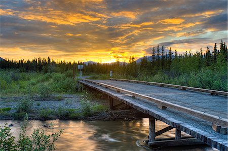 Sunset over Jack Creek off the Nabesna Road in Wangell St. Ellias National Park, Southcentral Alaska, Summer Fotografie stock - Rights-Managed, Codice: 854-03845548