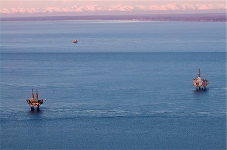 drilling (industrial) - Aerial evening view of oil platform in Cook Inlet, Southcentral Alaska, Winter Stock Photo - Rights-Managed, Code: 854-03846078