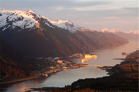 simsearch:854-03538698,k - Aerial view of downtown Juneau and harbor at sunset with two cruise ships in port, Southeast Alaska, Summer Stock Photo - Rights-Managed, Code: 854-03846122