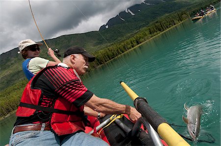 simsearch:854-03739733,k - A mature couple catch a Dolly Varden while rafting on the Kenai River near Cooper Landing, Kenai Peninsula, Southcentral Alaska, Summer Foto de stock - Con derechos protegidos, Código: 854-03846139