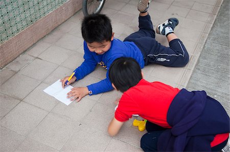 Children playing at the alley of their home at Kam Tin, New Territories, Hong Kong Stock Photo - Rights-Managed, Code: 855-05984186