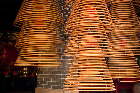 Spiral incense hanging at the shrine of Tsing Shan temple, New Territories, Hong Kong Stock Photo - Rights-Managed, Code: 855-05984215