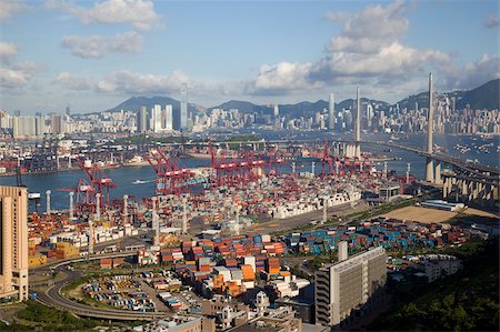 Overlooking Victoria Harbour and cargo terminal, Kwai Chung, Hong Kong Fotografie stock - Rights-Managed, Codice: 855-05984669