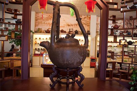 A big tea kettle symbolizing the teahouse, Chaozhou, China Stock Photo - Rights-Managed, Code: 855-05982153