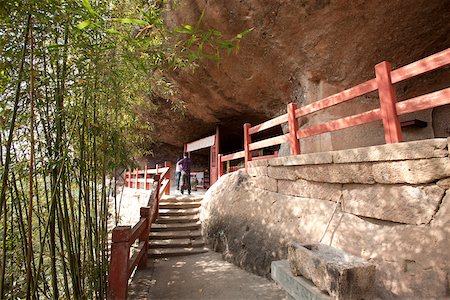 A Buddhist shrine at the cave, Roaring tiger rock Huxiaoyan, Yixiantian, Wuyi mountains, Fujian, China Stock Photo - Rights-Managed, Code: 855-05982397