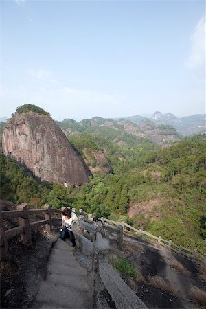 Mountain ranges view from Roaring tiger rock Huxiaoyan, Yixiantian, Wuyi mountains, Fujian, China Stock Photo - Rights-Managed, Code: 855-05982391