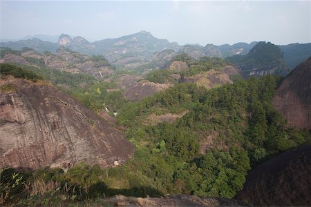 Mountain ranges view from Roaring tiger rock Huxiaoyan, Yixiantian, Wuyi mountains, Fujian, China Stock Photo - Rights-Managed, Code: 855-05982393