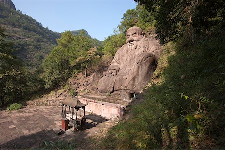 Rock sculpture of Laozi, Taoyuandong, Wuyi mountains, Fujian, China Stock Photo - Rights-Managed, Code: 855-05982424