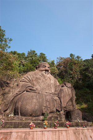 Rock sculpture of Laozi, Taoyuandong, Wuyi mountains, Fujian, China Stock Photo - Rights-Managed, Code: 855-05982427