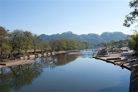 Bamboo rafts pier on 9 zigzag river  Jiuquxi and Yunu Peak, Wuyi mountain, Fujian, China Stock Photo - Rights-Managed, Code: 855-05982471