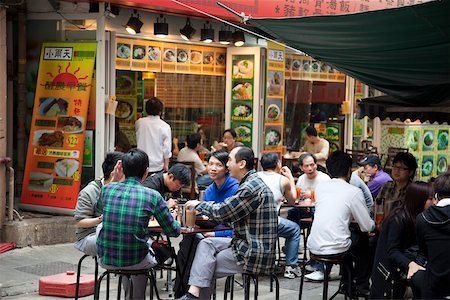 People dining at open-aired food store at Stanley Street, Central, Hong Kong Stock Photo - Rights-Managed, Code: 855-05983185
