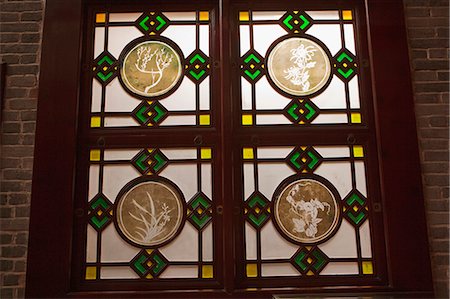 stain glass window - Stained glass window of an old cantonese villa exhibited at Liwan Museum, Xiguan, Guangzhou, China Stock Photo - Rights-Managed, Code: 855-06022478