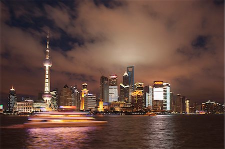 shanghai landmark - Skyline of Lujiazui Pudong from the Bund at night, Shanghai, China Stock Photo - Rights-Managed, Code: 855-06312194