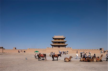 simsearch:855-06312772,k - Tourists riding on camel at Fort of Jiayuguan Great Wall, Jiayuguan, Silkroad, China Foto de stock - Con derechos protegidos, Código: 855-06312745