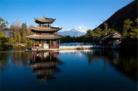 pavilion - Black Dragon Pool with Jade Dragon snow mountain at background, Lijiang, Yunnan Province, China Stock Photo - Rights-Managed, Code: 855-06312980