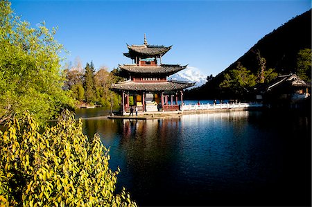 pavilion - Black Dragon Pool with Jade Dragon snow mountain at background, Lijiang, Yunnan Province, China Stock Photo - Rights-Managed, Code: 855-06312982