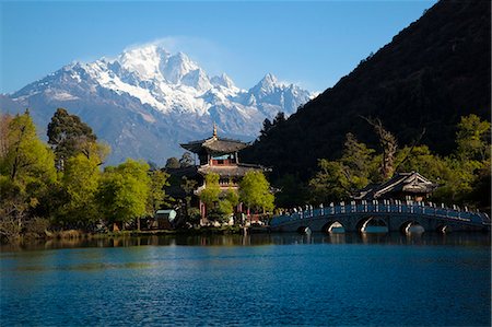 pavilion - Black Dragon Pool with Jade Dragon snow mountain at background, Lijiang, Yunnan Province, China Stock Photo - Rights-Managed, Code: 855-06312983