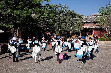 simsearch:855-08420833,k - Dance performance at Shuhe village, ancient  city of Lijiang, Yunnan Province, China Stock Photo - Rights-Managed, Code: 855-06312994