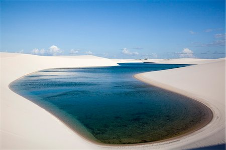 Sandy dunes near Lagoa Bonita (Beautiful Lagoon) at Parque Nacional dos Lencois Maranhenses, Brazil Stock Photo - Rights-Managed, Code: 855-06313115