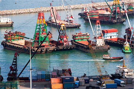 Container barge mooring at the shelter of Kowloon west, Hong Kong Stock Photo - Rights-Managed, Code: 855-06313343