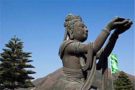 simsearch:855-05984035,k - Statue of deity at Giant Buddha shrine, Po Lin Monastery, Lantau, Hong Kong Foto de stock - Con derechos protegidos, Código: 855-06313495