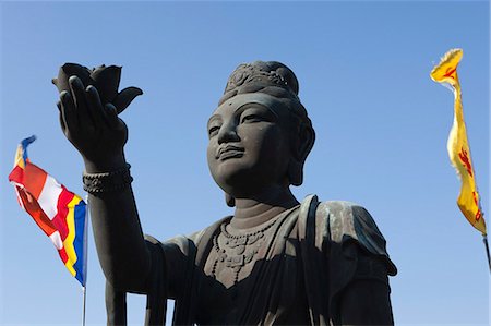 simsearch:855-05984035,k - Statue of deity at Giant Buddha shrine, Po Lin Monastery, Lantau, Hong Kong Foto de stock - Con derechos protegidos, Código: 855-06313493