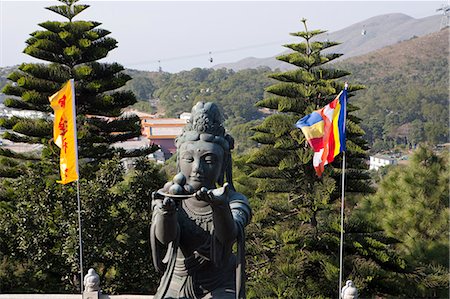 simsearch:855-05984035,k - Statue of deity at Giant Buddha shrine, Po Lin Monastery, Lantau, Hong Kong Foto de stock - Con derechos protegidos, Código: 855-06313508