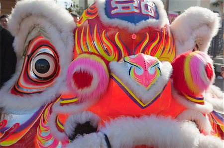 simsearch:855-05983077,k - Lion dance celebrating the Chinese New Year at Ngong Ping 360 village, Lantau Island, Hong Kong Foto de stock - Direito Controlado, Número: 855-06313626