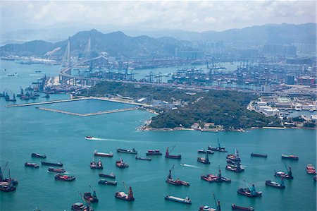 simsearch:855-05981096,k - Bird's eye sweep of Kwai Chung cargo terminal and Stonecutters Bridge from Sky100, 393 metres above sea level, Hong Kong Stock Photo - Rights-Managed, Code: 855-06313892