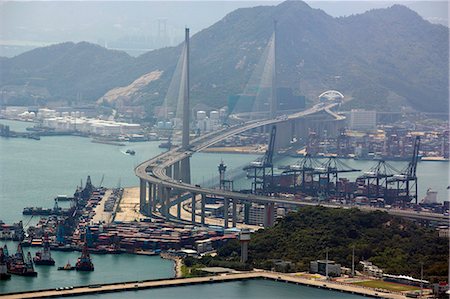 Bird's eye sweep of Kwai Chung cargo terminal and Stonecutters Bridge from Sky100, 393 metres above sea level, Hong Kong Fotografie stock - Rights-Managed, Codice: 855-06313937