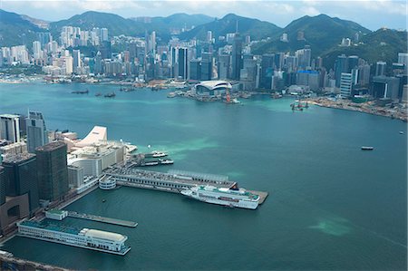 Bird's eye sweep of Tsimshatsui area and Hong Kong skyline from Sky100, 393 metres above sea level, Hong Kong Foto de stock - Con derechos protegidos, Código: 855-06313969