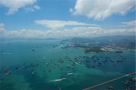 simsearch:855-05983354,k - Bird's eye sweep of Kwai Chung cargo terminal and Stonecutters Bridge from Sky100, 393 metres above sea level, Hong Kong Stock Photo - Rights-Managed, Code: 855-06313961