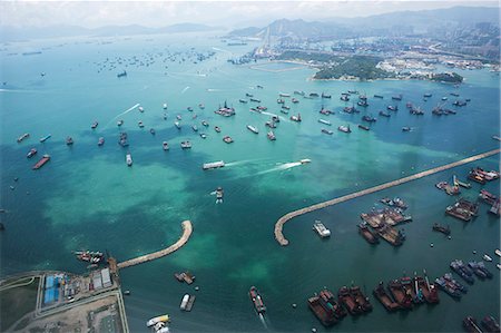 Bird's eye sweep of Kwai Chung cargo terminal and Stonecutters Bridge from Sky100, 393 metres above sea level, Hong Kong Stock Photo - Rights-Managed, Code: 855-06313962