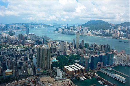 simsearch:855-06313965,k - Bird's eye sweep of Tsimshatsui area and Hong Kong skyline from Sky100, 393 metres above sea level, Hong Kong Fotografie stock - Rights-Managed, Codice: 855-06313971