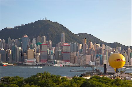 sheung wan - Sheung Wan skyline from Kowloon west, Hong Kong Foto de stock - Con derechos protegidos, Código: 855-06337654