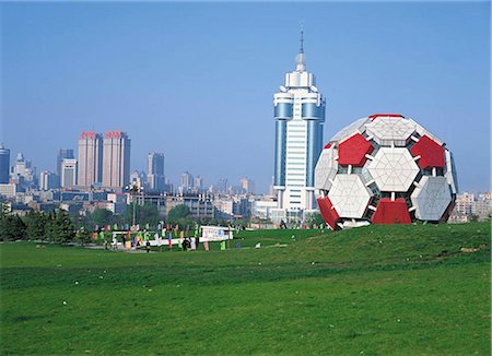 dalian china - Labour Park, with the Dalian city Art of Architecture gallery in soccer shape Stock Photo - Rights-Managed, Code: 855-02985662