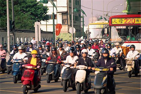Motorcyclist at rush hour, Taipei Stock Photo - Rights-Managed, Code: 855-02985714